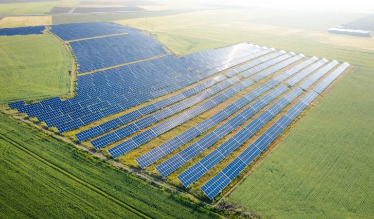 Solar array set into a green agricultural field