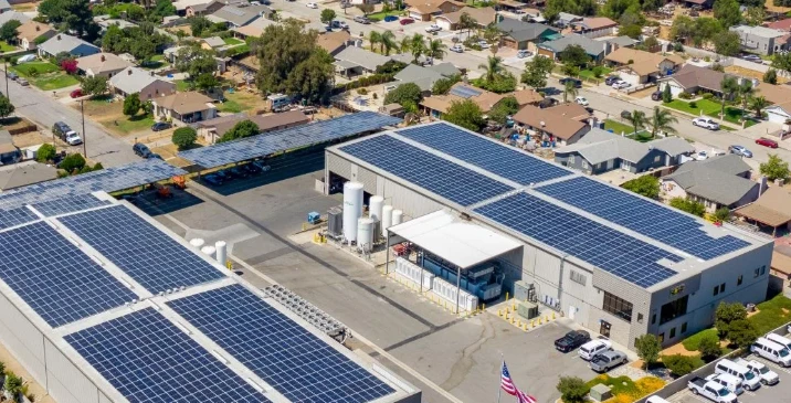 Manufacturing facility with solar arrays on its roofs